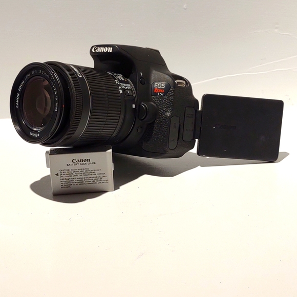 Canon EOS Rebel T5i digital camera, Black w/ Silver lettering, EFS